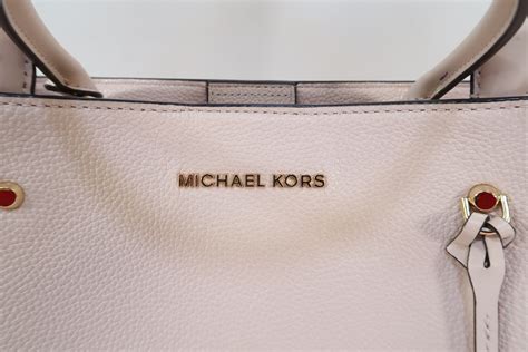 michael kors arielle satchel pink|Michael Kors pink suitcase.